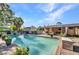 Backyard pool area with lush landscaping, providing a private and tranquil outdoor space at 25082 Harborview Rd, Punta Gorda, FL 33980