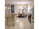 Modern kitchen island with granite countertops, stainless steel appliances and adjoining dining area, perfect for gatherings at 25224 Lahore Ln, Punta Gorda, FL 33983