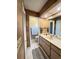 Spacious bathroom with double sinks and a view to a water closet at 2526 Brazilia Ct, Punta Gorda, FL 33950