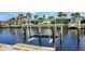 Close-up of boat lift providing direct access to the canal for boating enthusiasts at 2526 Brazilia Ct, Punta Gorda, FL 33950