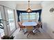 Breakfast nook with tile floors, lots of natural light and access to outside at 2526 Brazilia Ct, Punta Gorda, FL 33950