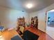 Bright office space with wood floors, built-in bookcase, and plenty of natural light at 2526 Brazilia Ct, Punta Gorda, FL 33950