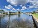 Waterfront view of canal with docks and adjacent houses at 2526 Brazilia Ct, Punta Gorda, FL 33950