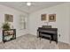 Cozy bedroom featuring neutral carpeting, light walls, and ample natural light, creating a serene atmosphere at 25272 E Lenox Cir, Punta Gorda, FL 33950