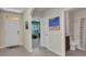Inviting foyer that provides a seamless transition into the home's elegant interior and well-lit spaces at 25272 E Lenox Cir, Punta Gorda, FL 33950