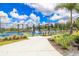Community tennis and pickleball courts surrounded by lush landscaping offer a resort-style experience at 25272 E Lenox Cir, Punta Gorda, FL 33950