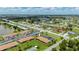 Beautiful aerial view of condo buildings surrounded by lush landscaping and trees at 25275 Rampart Blvd # 404, Punta Gorda, FL 33983