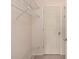 Walk-in closet featuring built-in wire shelving and a door at 25275 Rampart Blvd # 404, Punta Gorda, FL 33983