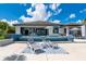 Spacious backyard with lounge chairs by the pool, perfect for soaking up the sun and enjoying the outdoors at 25462 Shore Dr, Punta Gorda, FL 33950