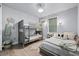 Comfortable bedroom with bunk beds, twin bed, and charming coastal decor at 25462 Shore Dr, Punta Gorda, FL 33950