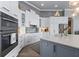 Spacious kitchen with custom cabinets, stainless steel appliances, and a center island at 25462 Shore Dr, Punta Gorda, FL 33950