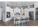 Kitchen with stainless steel appliances, custom cabinets, and a breakfast bar at 25462 Shore Dr, Punta Gorda, FL 33950