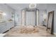 Main bathroom features dual vanities, walk in shower, and tile floors at 25462 Shore Dr, Punta Gorda, FL 33950