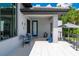 Charming patio with stylish seating, complemented by decorative accents and ample natural light at 25462 Shore Dr, Punta Gorda, FL 33950