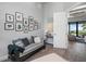 Sitting area with wood floors, comfortable seating, and natural light at 25462 Shore Dr, Punta Gorda, FL 33950