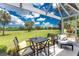 Inviting lanai with golf course vistas, perfect for outdoor enjoyment at 26254 Stillwater Cir, Punta Gorda, FL 33955