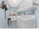 Functional laundry room with ample storage cabinets and modern appliances at 26254 Stillwater Cir, Punta Gorda, FL 33955