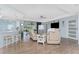 Bright living room with comfortable furniture and seamless access to an outdoor patio at 26254 Stillwater Cir, Punta Gorda, FL 33955