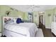 Comfortable bedroom with white bedding, stylish decor, and a calming atmosphere at 26310 Rampart Blvd # 504, Punta Gorda, FL 33983