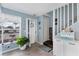 Inviting foyer features tile flooring, stairs to the upper level, and lots of natural light at 26310 Rampart Blvd # 504, Punta Gorda, FL 33983