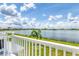 Breathtaking lake view from the balcony on a clear, sunny day at 26310 Rampart Blvd # 504, Punta Gorda, FL 33983