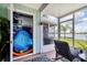 Screened lanai with an organization closet and views of the lake at 26310 Rampart Blvd # 504, Punta Gorda, FL 33983
