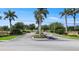 Lush entryway to a beautiful community at 2736 Suncoast Lakes Blvd, Punta Gorda, FL 33980