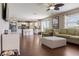 Open-concept living space integrates a modern kitchen with a comfortable seating area at 2736 Suncoast Lakes Blvd, Punta Gorda, FL 33980