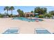 The community pool is a refreshing gathering place with poolside seating and clear water at 2736 Suncoast Lakes Blvd, Punta Gorda, FL 33980