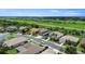 Charming street featuring attractive homes with well-kept lawns in a serene neighborhood setting at 2736 Suncoast Lakes Blvd, Punta Gorda, FL 33980