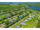 Wide aerial view of the Estates on the Peace River community featuring waterfront canals and custom homes at 28960 Gin Ln, Punta Gorda, FL 33982