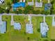 An aerial view shows this home with well-maintained landscaping and a new roof in a waterfront neighborhood at 28960 Gin Ln, Punta Gorda, FL 33982