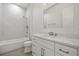 Newly remodeled bathroom features granite vanity, a full-sized tub, and large tiled shower at 28960 Gin Ln, Punta Gorda, FL 33982