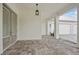 Spacious front porch with tile pavers and exterior lighting at 28960 Gin Ln, Punta Gorda, FL 33982