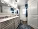 This bathroom features double sinks and modern fixtures at 319 Kindred Blvd, Port Charlotte, FL 33954