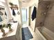 Bathroom featuring granite topped vanity, tub and shower, and light tile flooring at 319 Kindred Blvd, Port Charlotte, FL 33954