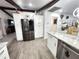 An efficient kitchen features modern appliances and ample storage at 319 Kindred Blvd, Port Charlotte, FL 33954