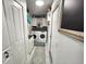 This laundry room has a modern washer and dryer at 319 Kindred Blvd, Port Charlotte, FL 33954