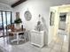 Cozy breakfast nook with a charming table and a view of the outdoor living space at 319 Kindred Blvd, Port Charlotte, FL 33954