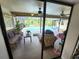 This patio has ample space with furniture and views of the pool at 319 Kindred Blvd, Port Charlotte, FL 33954