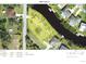 Aerial view highlights a waterfront property with lush landscaping, nearby canals, and convenient road access in a vibrant neighborhood at 3456 Highlands Rd, Punta Gorda, FL 33983