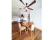 Charming dining area with hardwood floors, a round table, and stylish chairs at 3456 Highlands Rd, Punta Gorda, FL 33983