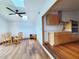 Dining area next to kitchen, featuring a table, chairs, ceiling fan and skylights at 3456 Highlands Rd, Punta Gorda, FL 33983