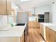 Well-lit kitchen featuring stainless steel appliances and light wood cabinetry at 3456 Highlands Rd, Punta Gorda, FL 33983