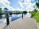 Scenic waterfront view from the private dock, featuring a boat lift and direct access to the Gulf at 3456 Highlands Rd, Punta Gorda, FL 33983