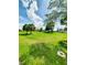 Expansive lawn provides ample space for outdoor activities, with the potential to add a pool or other amenities at 3456 Highlands Rd, Punta Gorda, FL 33983