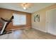 Bedroom with hardwood floors, ceiling fan, window with blinds and a painting on the wall at 3512 Nekoosa St, North Port, FL 34287