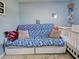 Cozy bedroom featuring a sofa with pull out storage at 3512 Nekoosa St, North Port, FL 34287