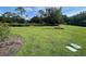 Open, grassy community green space at 3512 Nekoosa St, North Port, FL 34287