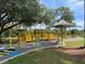Playground with diverse play structures, providing children with multiple play opportunities at 3512 Nekoosa St, North Port, FL 34287